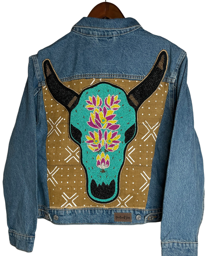 Denim jacket with added hand beaded Turquoise cow skull on African Mud